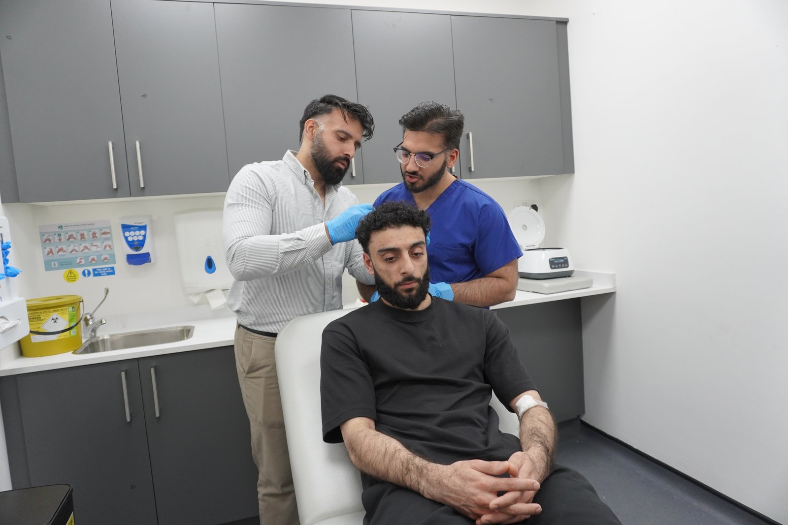 A doctor in consultation with a patient at Sadiqi Medical Centre